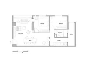 Floor plan of a modern apartment with two bedrooms, a bathroom, a kitchen, a living room, a dining area, and a balcony.
