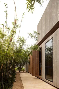 A modern building with concrete exterior features minimalistic design elements.