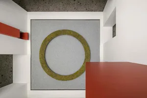 A modern interior floor plan featuring a circular concrete design element.