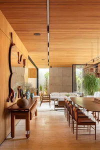 Contemporary living and dining area featuring modern furnishings and a seamless open-concept layout