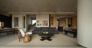 Modern living room with neutral color palette and minimalist design.