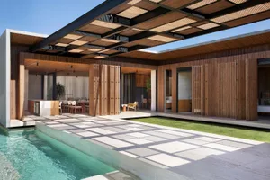 Modern residential exterior featuring natural wood materials and a sleek, minimalist design.