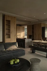 A modern living room featuring wooden furniture, including a grey sofa, a round wooden coffee table, and a wooden dining tabl