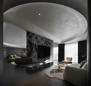 A modern living room featuring marble accents and a contemporary aesthetic.