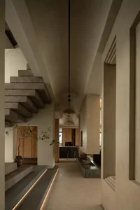 Concrete stairs and walls in a minimalist residential interior
