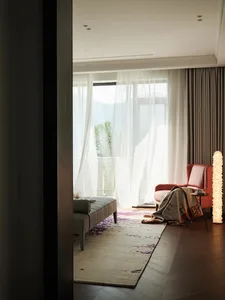 Modern living room with a long bench, a pink armchair, and a floor lamp by a window with translucent curtains.