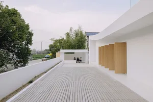 White concrete office space with modern design.