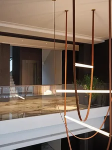A modern residential interior featuring contemporary design elements and materials.