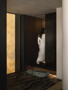 A minimalist French door with a metallic frame, featuring a sleek, contemporary design.