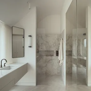 Modern bathroom with marble walls and floor