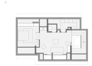 Floor plan of a modern residential interior with open spaces and minimalist design elements.