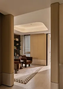 Modern living room with wooden furniture, comfortable seating, and a cozy atmosphere.