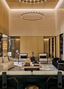 A modern living room featuring textured wood elements and contemporary furniture.