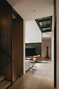 Modern living room with wood accents and minimalist design