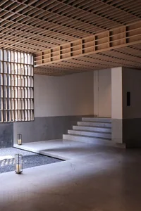 Concrete stairwell with modern lighting fixtures