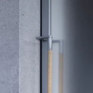 A close-up image of a modern design featuring concrete material, showcasing the texture and finish of contemporary architectu