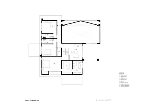 Floor plan of a modern residential building with concrete materials.