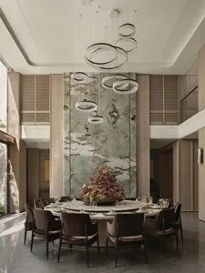 Modern dining room featuring marble and concrete elements