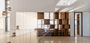 Modern interior design featuring wooden shelves.