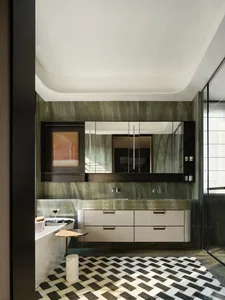 Modern luxury bathroom featuring a marble vanity, mirror cabinet, and geometric floor tiles.