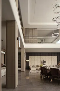 Modern living and dining room in an open-plan design with marble features.