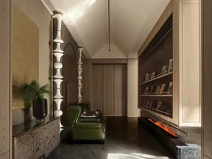 A modern living room with stone fireplace, green chairs, and marble accents