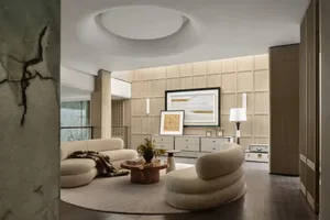 Modern minimalist living room with neutral color palette and stylish decor.