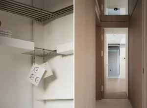 Modern interior closet space featuring metal shelves and wood paneling.