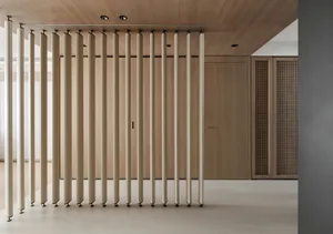 Modern minimalist interior design featuring a metal divider.