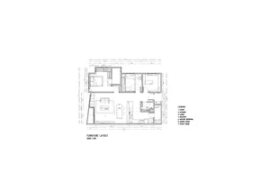 Floor plan of a residential interior showcasing the layout of rooms and furniture arrangement.