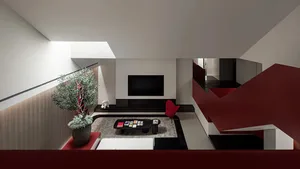 Modern living room with sleek, metallic red accents and minimalist design.