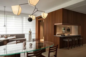 A modern residential kitchen featuring wood elements