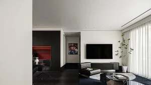 A spacious modern black living room with a large flat-screen TV and a minimalist design.