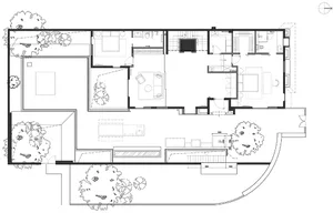 Black and white architectural drawing of a modern house layout with several rooms and outdoor space.