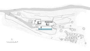 A minimalist architectural floor plan featuring a modern design with clean lines and open spaces.