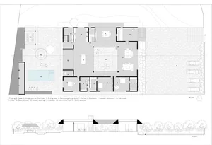 a minimalist residential floor plan including parking, foyer, living room, courtyard, dining area, secondary living area, kit