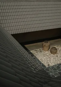 A terracotta roof with two pots on a mosaic tile floor.