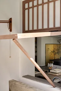 Modern interior with wooden beams and minimalist design