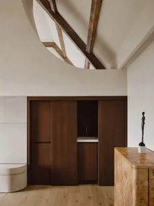 Modern bathroom with solid wood features and white fixtures