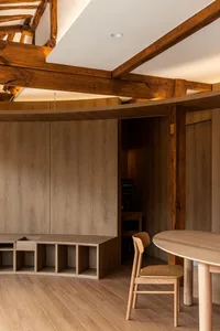 Modern residential kitchen featuring timber elements.
