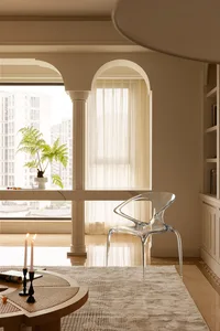 Modern residential interior design featuring glass, marble, and wooden elements.