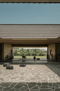 View of a minimalist residential interior with a combination of terrazzo and stone materials.