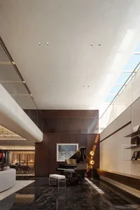 Modern interior design featuring a black marble living space with a grand piano and a glass wall.