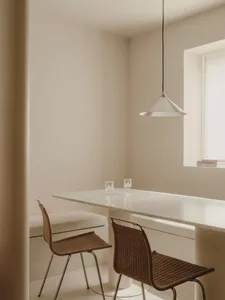 Modern minimalist kitchen with white marble table and chairs