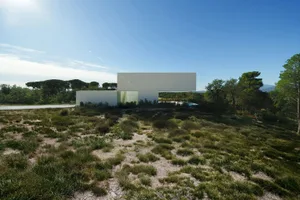 Modern building with glass and concrete exterior.