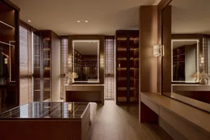 Modern interior design featuring concrete and wood materials.