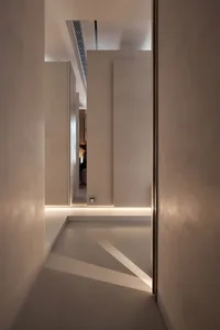 Modern minimalist interior space with walls in white plaster.