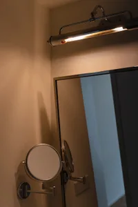 An industrial-style mirror made of metal material.