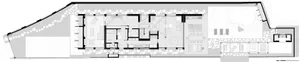 Floor plan of a modern house with concrete and glass materials.