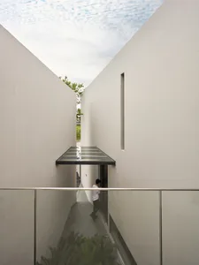 Minimalist interior design with glass and concrete elements
